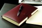 Preview: Notizbuch DIN A5 (gebunden) mit Stecklasche | Echtleder | CAMBRIDGE rot