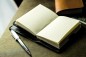 Preview: Pocket Notizbuch PREMIUM LEDER BOXCALF schwarz (glatt) inclusive Drehkugelschreiber ART DECO